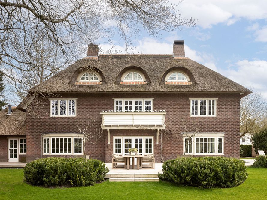 100-year-old Dutch home with original frames and doors upgraded with ultra-thin LandVac vacuum glazing